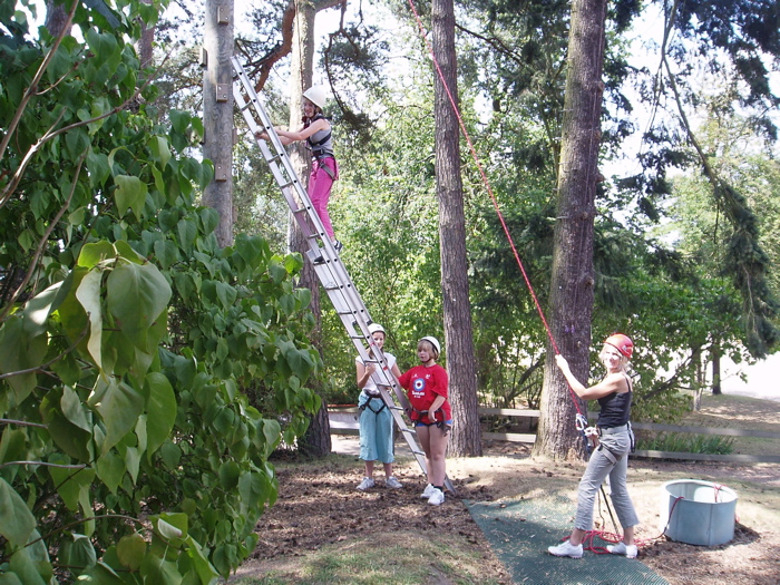 Amy climbs the ladder and has a go at Trapeze