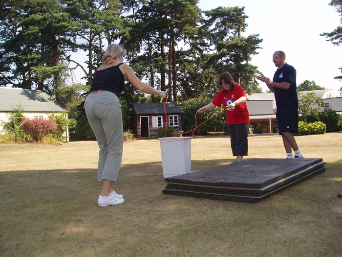 Lift the "bomb" from the mat, using only a rope, and not touching anything else