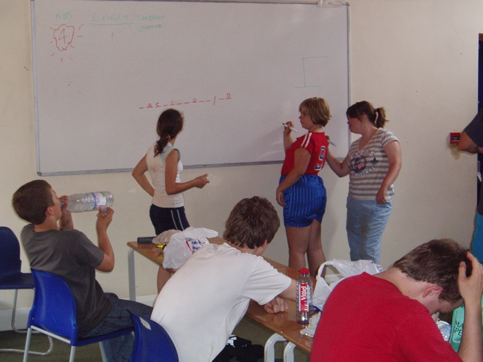 After a long, hot morning in full sun, we retreat for lunch in a cool classroom